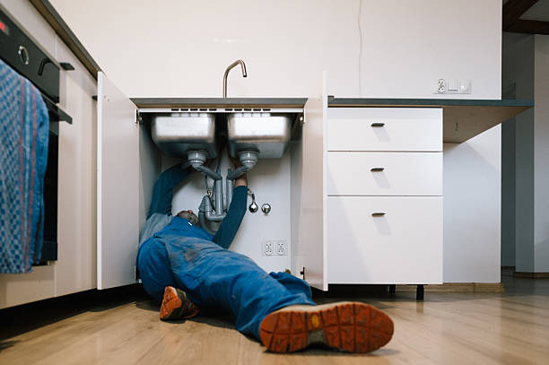 Professional Drain Cleaning technician working in Pickwick Dam, TN